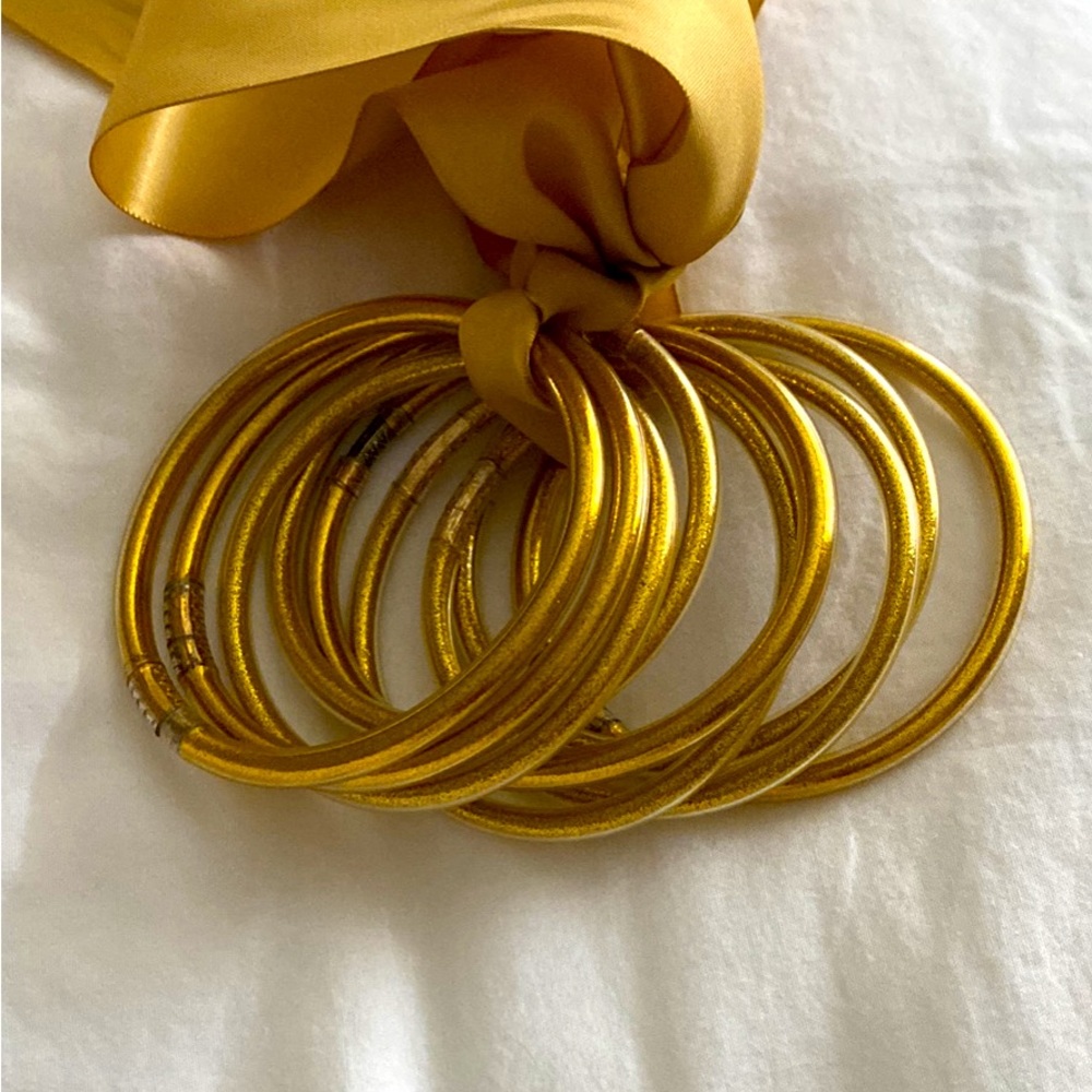9 Glittery Gold Bracelets like new condition